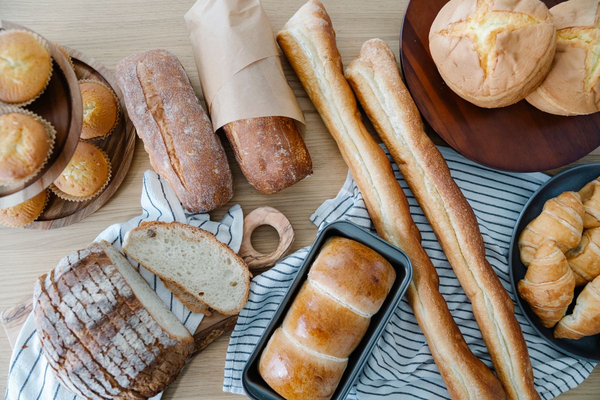 Fresh bread and pastries on a café table